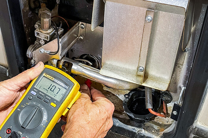 Person servicing an RV